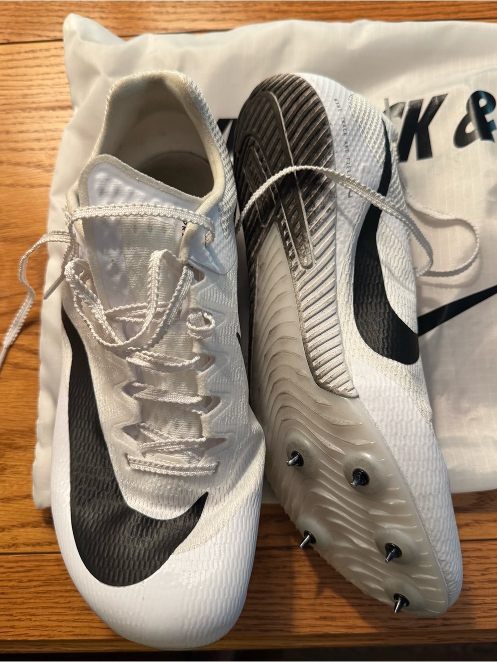 Nike Men’s White Athletic Track Spikes with Black Swoosh